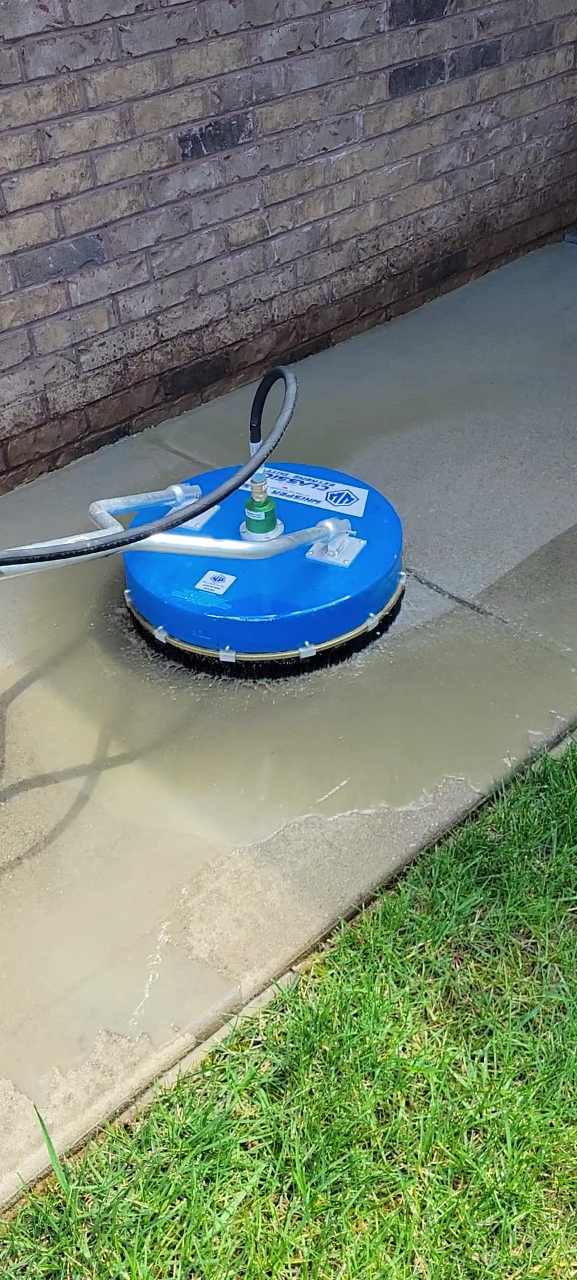 Pressure washing Maryville concrete with a surface cleaner